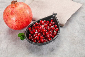 Ripe sweet red pomegranate seeds