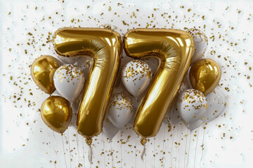 Festive celebration decor featuring large gold foil-number balloons forming the number 77, surrounded by white and gold balloons and confetti for a milestone event celebration