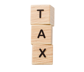 Wooden blocks stacked vertically showing tax concept for finance and accounting