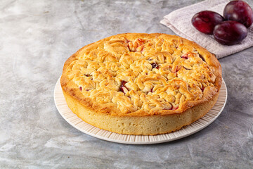 Sweet homemade pie with plums