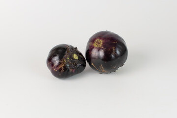 Two round eggplants