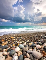 Beach scene with colorful stones and dramatic sky