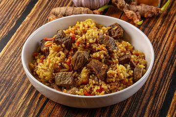 Asian traditional pilaf with beef