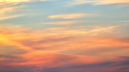 Awesome sunset and soft pink clouds of pastel tones. Image template of textured sky. Bright epic...