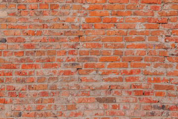 Old red brick wall. Background