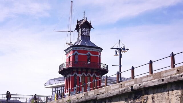 Clock Tower at the V&A Waterfront in a harbor of Cape Town, South Africa. major landmark, tourists visiting travel destination in Africa. 