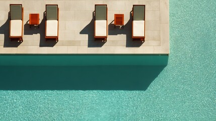 Swimming pool with sun loungers. View from above. luxury hotel resort. Aerial view of a luxury swimming pool.
