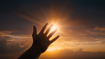 A human hand reaches toward the sky. Symbol of prayer, hope, and seeking God&rsquo;s guidance and divine support.