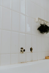 A view of the protruding tubing from the bathroom faucet.