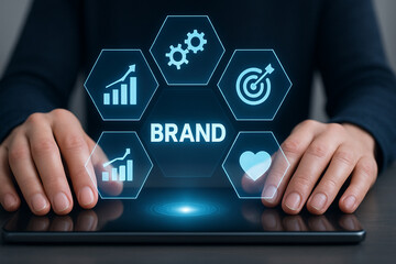 Professional digital branding concept with hands on tablet and glowing holographic icons for marketing, growth, creativity, and innovation strategy