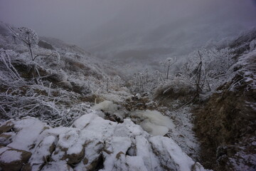 Snowy Mountains of Azerbaijan with Morning Fog