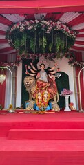 Idol of Goddess Devi Durga at a decorated puja pandal , Durga Puja is a famous and major religious traditional festival of Hinduism that is celebrated throughout the world.
