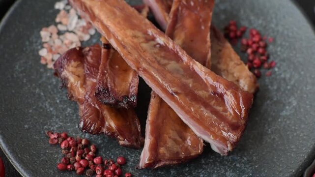 Grilled or barbecued pork or beef ribs with sauce. Cooked or smoked ribs as a food backdrop for your design