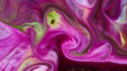 This stock video features an extreme close-up shot of a thick mixture of colored liquid paints spreading on the surface in slow motion. T - Powered by Adobe