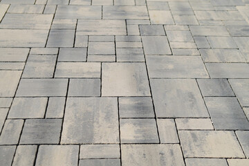 Laying paving slabs close-up