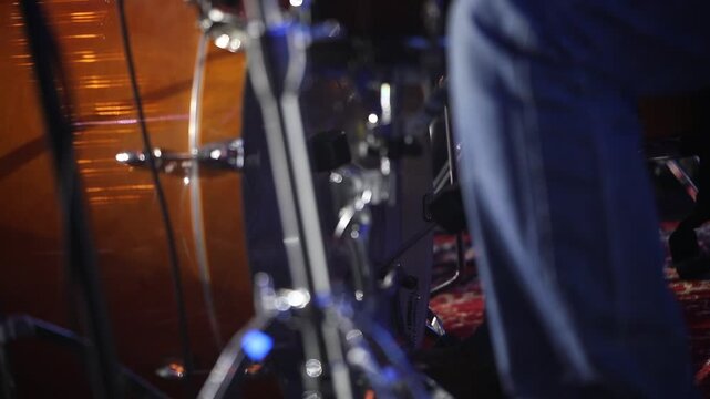 Montage of a musician intensely playing both a drum kit (cymbals) and bongo drums, highlighting dynamic percussion and rhythmic performance in a studio setting.