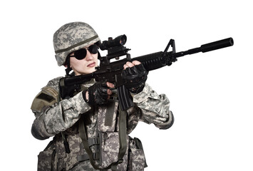 Man in an American soldier's uniform holds a rifle and aims it.