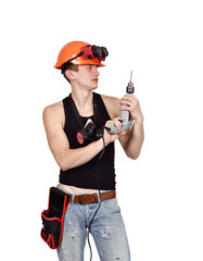 A male builder holds a drill in his hands