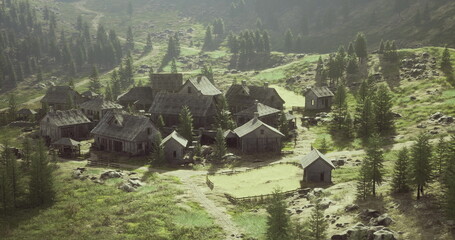 A peaceful village is located in a mountainous area with rustic buildings. Lush greenery and trees envelop the settlement, creating a serene natural environment suitable for exploration. © icetray