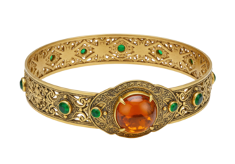 Ornate gold bangle with amber and emerald gemstones isolated, vintage jewelry for fashion accessory and elegant style