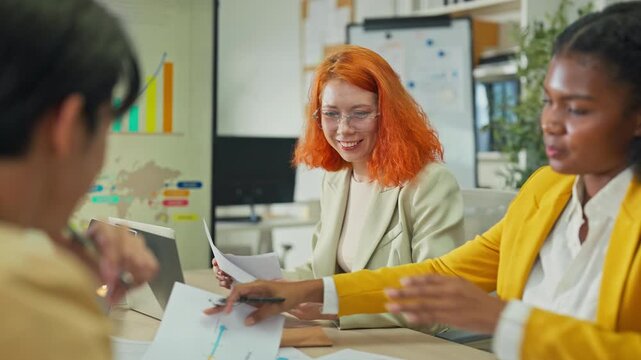 Diverse multiethnic fintech professionals collaborate in agile hackathon workshop, sharing adaptive business strategies through AI-powered big data analytics for exponential growth and convergent