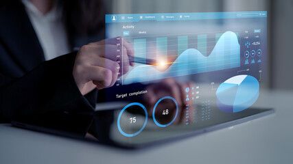 A professional display of business analytics with interactive graphs and metrics on a digital tablet in a modern office, illustrating data-driven decisions. Impute