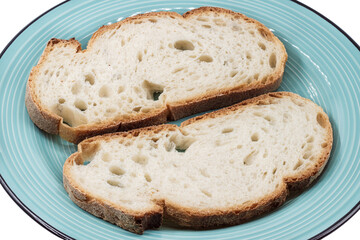 Slices of rustic Italian bread from Frosinone, Lazio region. Artisan loaf with golden crust and airy crumb, a traditional bakery product from central Italy.