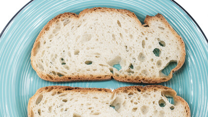 Slices of rustic Italian bread from Frosinone, Lazio region. Artisan loaf with golden crust and airy crumb, a traditional bakery product from central Italy.
