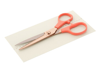 Salmon-colored scissors cutting along a dotted line on paper isolated, craft tool for scrapbooking and DIY projects