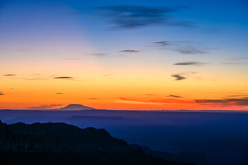 Colorful sunrise over mountain landscape as viewed from Point Imperial, Grand Canyon National Park north rim, Arizona

