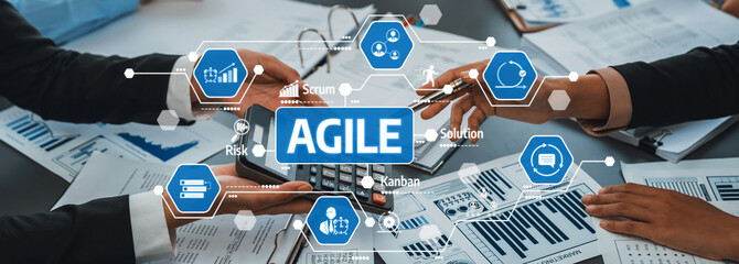 Team Collaboration in Agile Project Management with Charts, Data Analysis, and Modern Technology in a Bright Office Environment. Amity