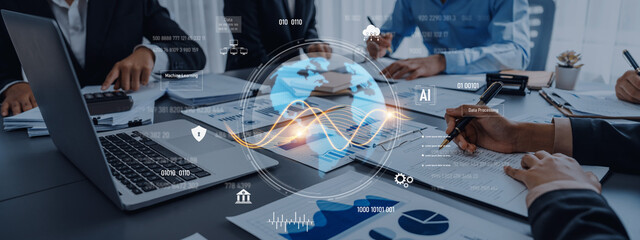 A modern business meeting depicted with technology integration, showcasing data analytics, teamwork, and strategic discussions in a professional workspace setting. Trope