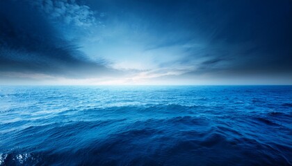 Fototapeta premium Hazy Blue Horizon Glow Over Dramatic Ocean Texture