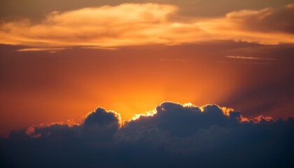 Obraz premium Sunset Behind The Cloud And Orange Sky