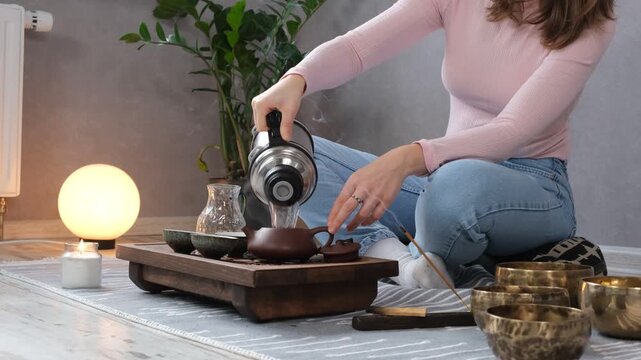 Woman enjoy tea ceremony at home and meditative atmosphere