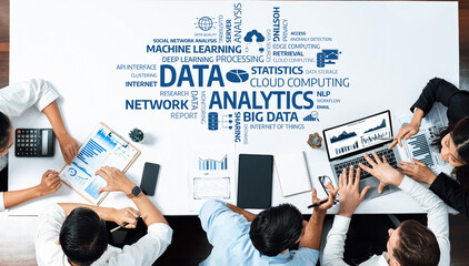 A dynamic business team collaborates on data analytics, utilizing various technology tools and visual graphs in a modern office setting, showcasing teamwork and insight generation. Amity