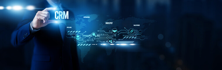 Businessman hold word CRM, customer relationship management, sales automation platforms, lead...