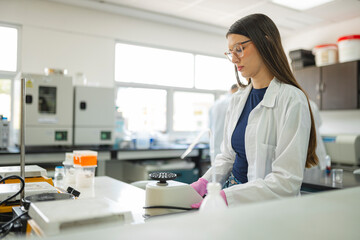 Female scientist working with laboratory 