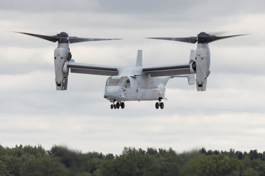 United States Marine Corps V22 Osprey Aircraft in Flight Symbolizing Aviation Technology and Humanitarian Missions
