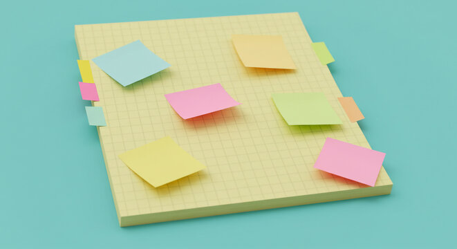 Notebook pad featuring square grid paper patterns and various sticky notes scattered on a bright teal tabletop.