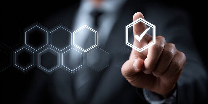 A hand in a suit touches a digital checkmark