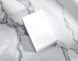 Blank white box on marble surface