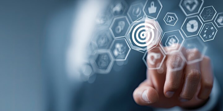 A hand touches a holographic target surrounded by various icons