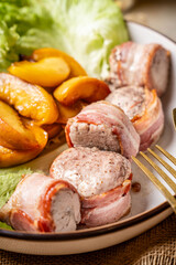 Bacon wrapped chicken medallions with peaches