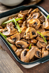 Roasted champignon mushrooms with herbs