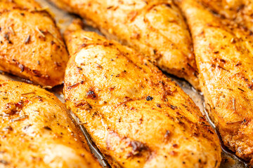 Juicy baked chicken breasts closeup
