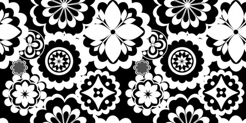 Black white seamless background with flowers .
Abstract, repeating regular pattern for print .
Graphic design with regular shapes.