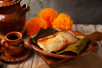 Oaxacan Tamale. Prehispanic dish typical of Mexico and some Latin American countries. Corn dough wrapped in banana leaves. The tamales are steamed.