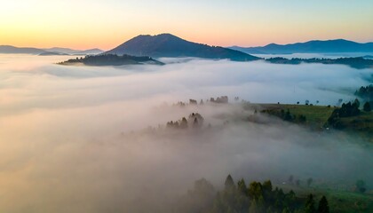Misty mountain landscape at sunrise