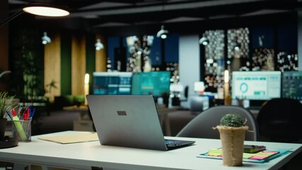 Empty business office at night showcasing data reports and analytics, midnight glow and lights in the company boardroom. Modern workspace with financial projections for management. - Powered by Adobe